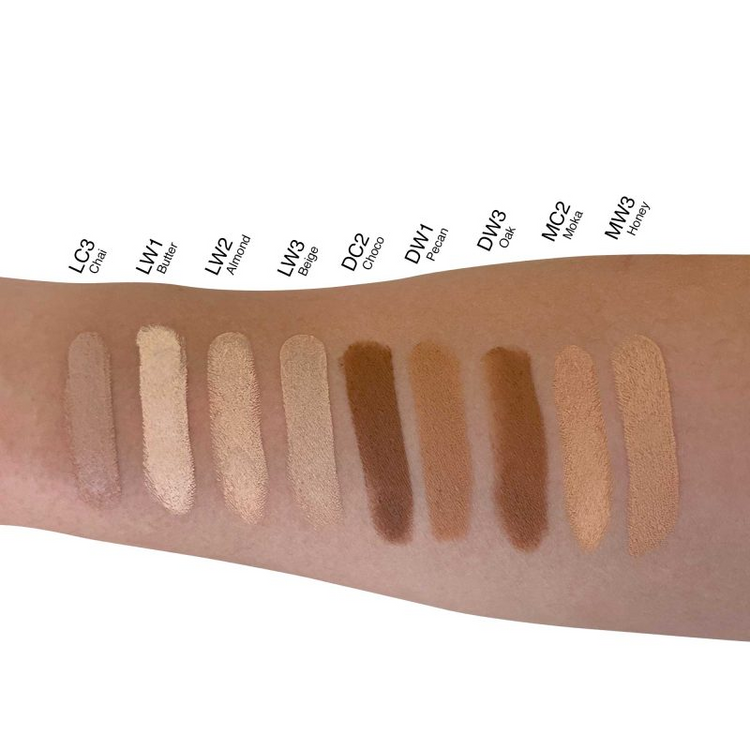 a person's arm with different shades of makeup