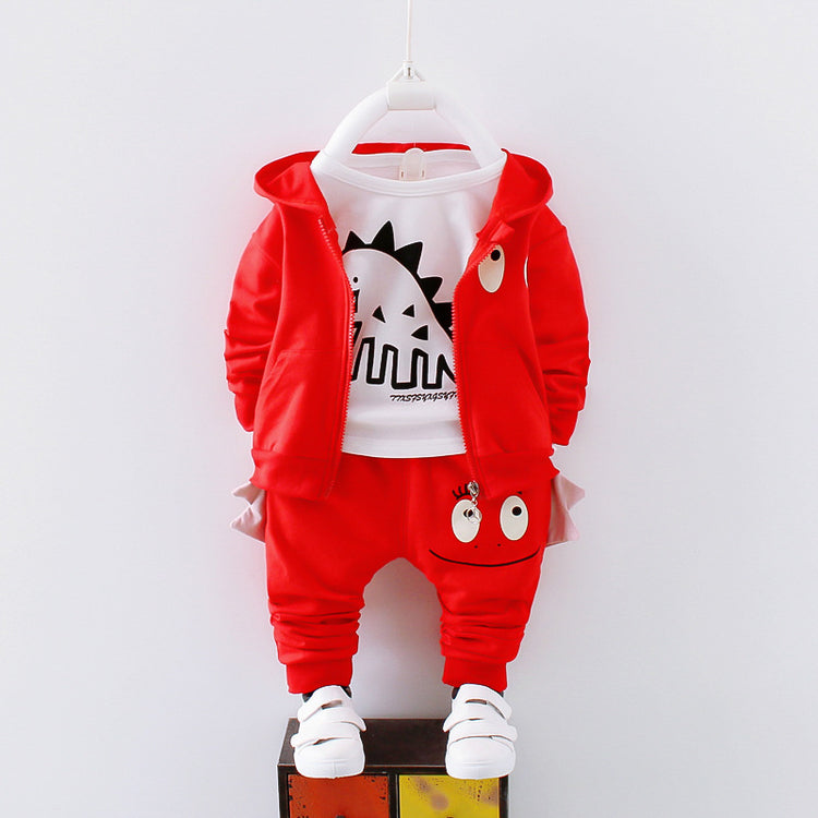 a red jacket and pants on a white wall