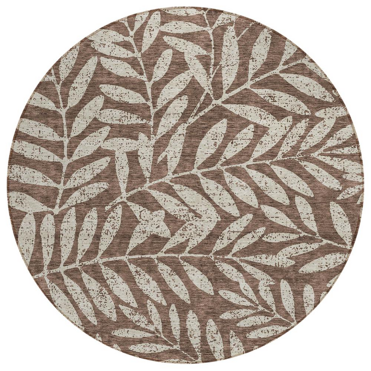a circular rug with leaves on it