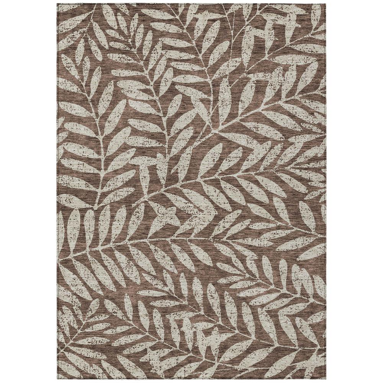a brown and white rug with leaves