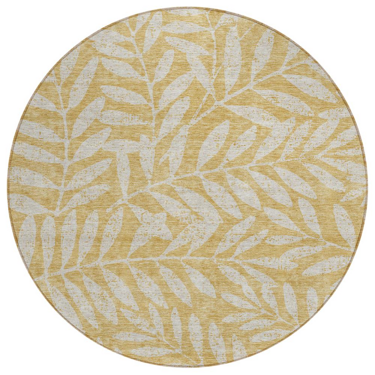 a round rug with leaves on it