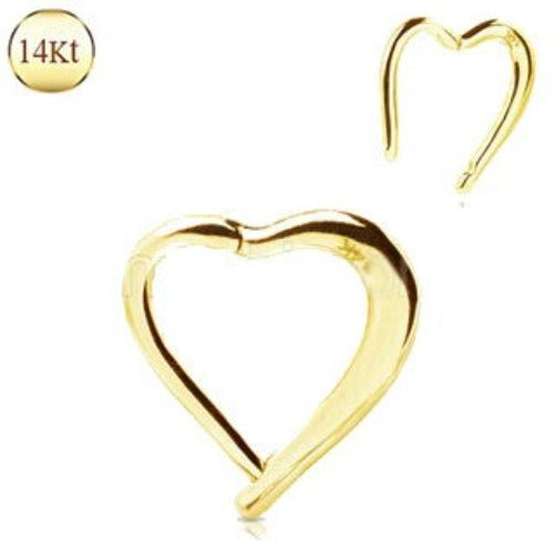 a gold heart shaped earrings