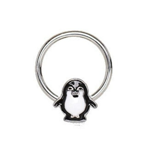 a silver ring with a penguin