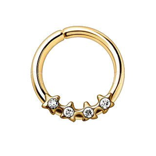 a gold ring with diamonds