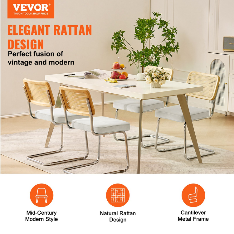 a white table with chairs and a plant