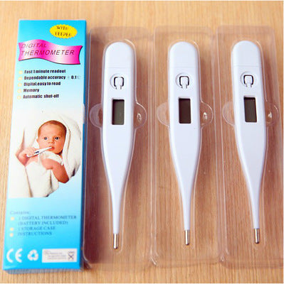 a group of white electronic thermometers