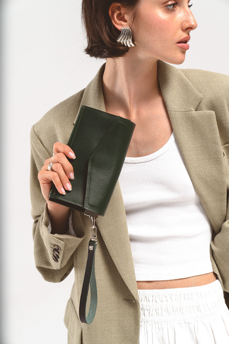 a woman holding a purse