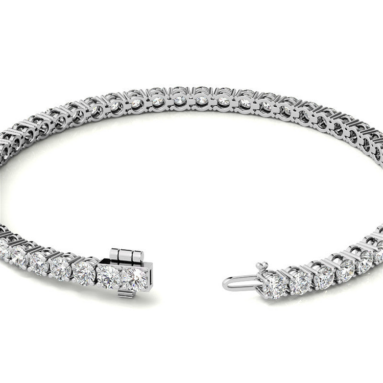 a silver bracelet with diamonds