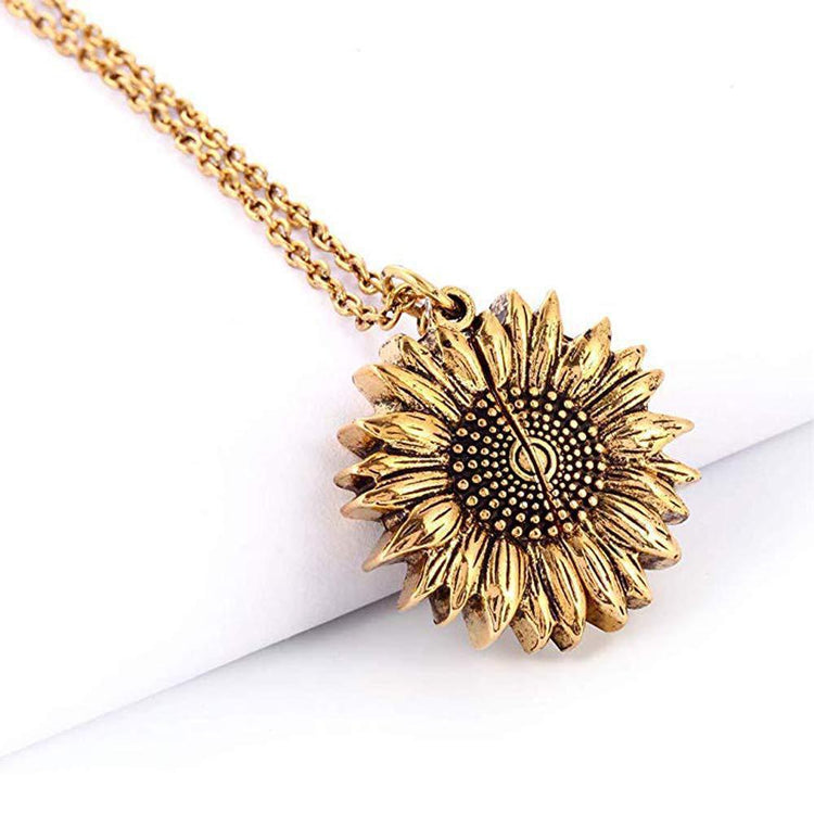 a gold sunflower necklace
