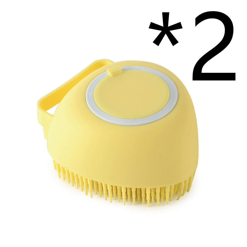 a yellow brush with a handle