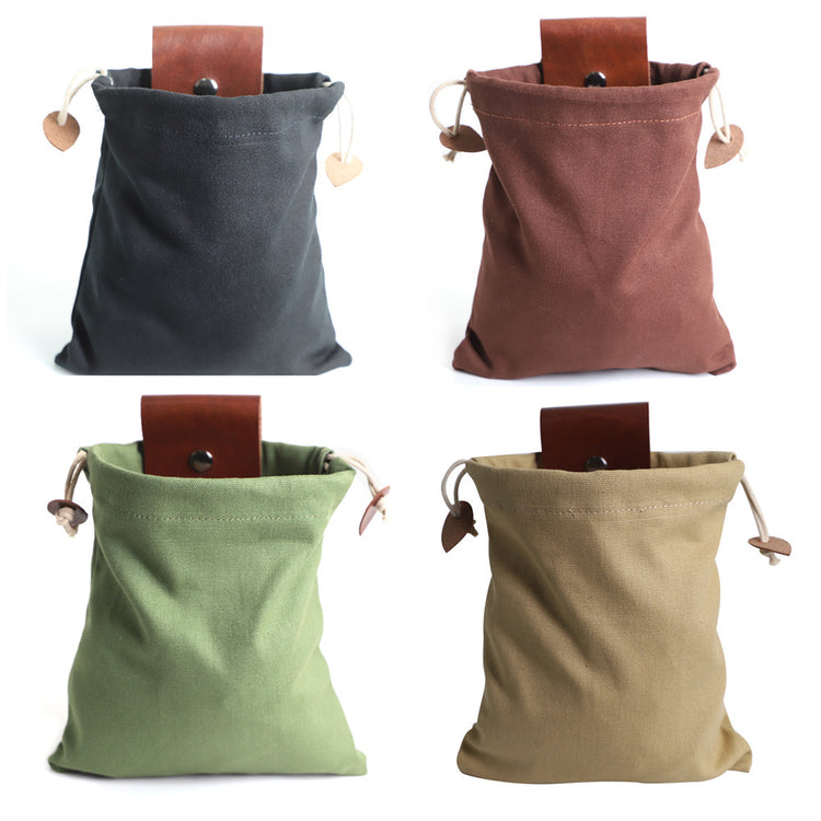 a group of bags with a leather tag