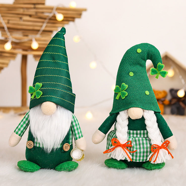 two green gnomes with white beards and green hats