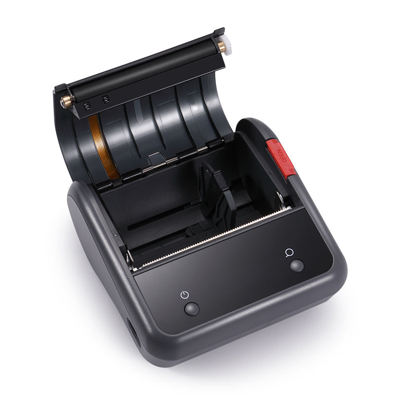 a black printer with a red and black handle