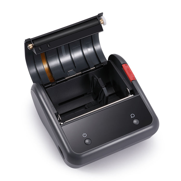 a black printer with a red and black handle