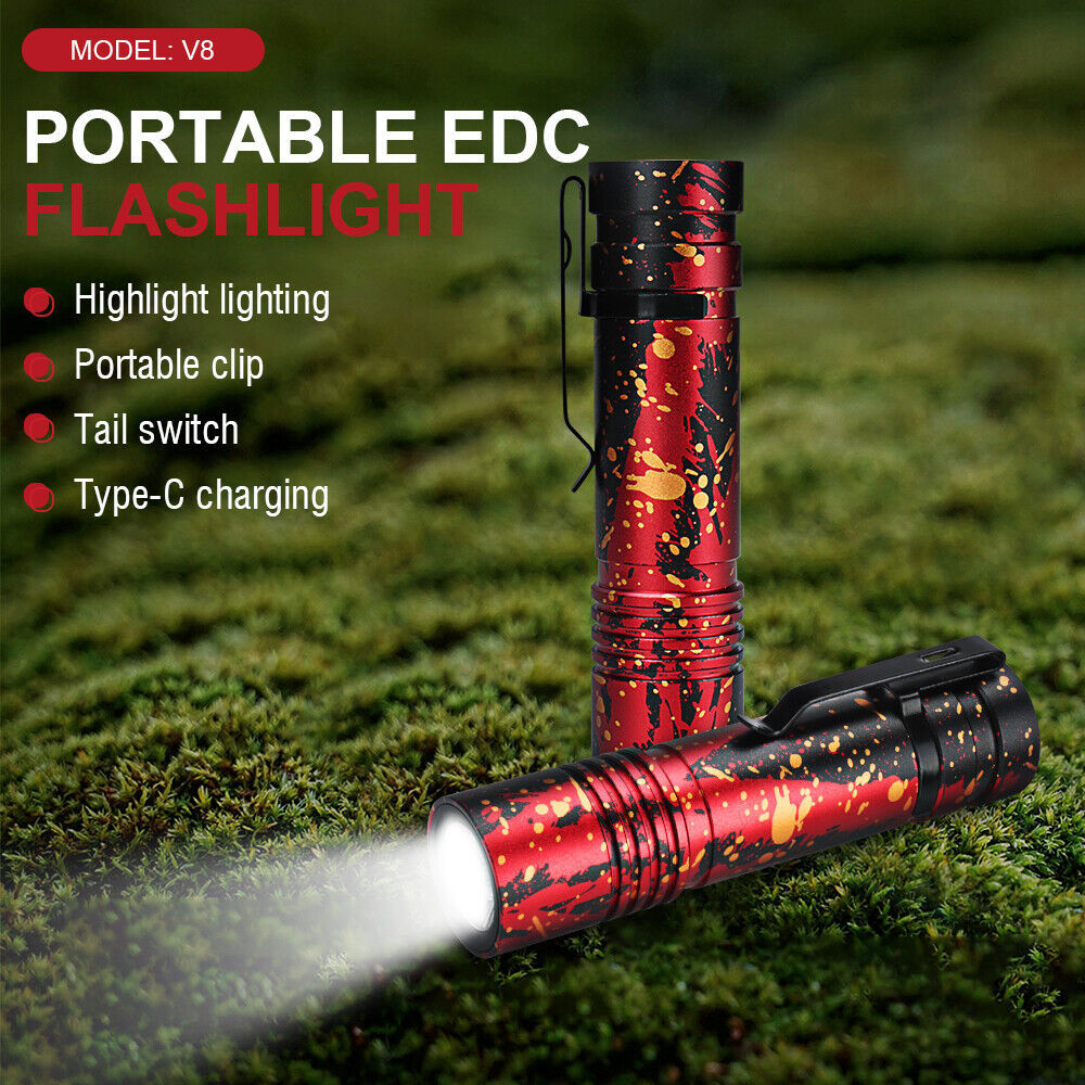 a red flashlight with white light coming out of it