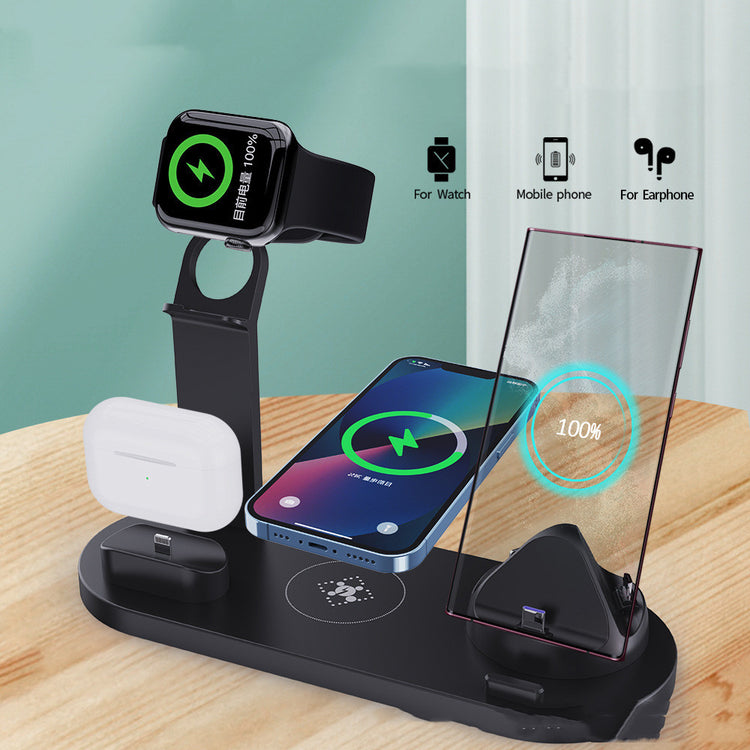 a smart watch and phone on a charging station