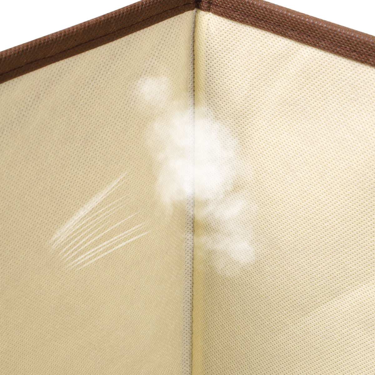 a white cloud coming out of a corner of a fabric surface