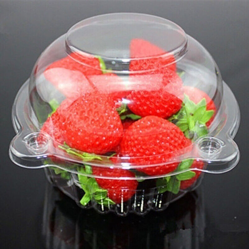 a plastic container with strawberries in it
