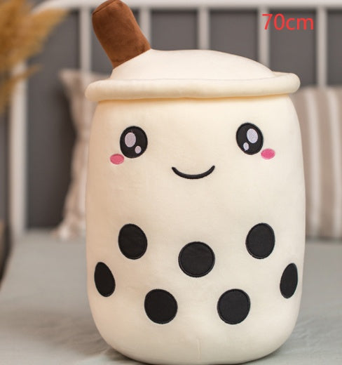a white and black plushie of a bubble tea