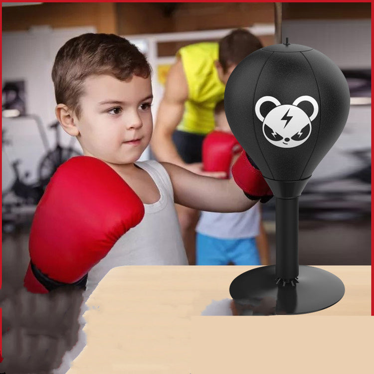a boy wearing boxing gloves