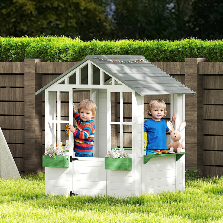 two children in a playhouse