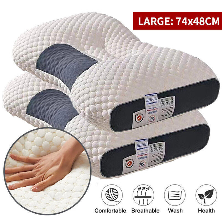 a stack of pillows with a hand on it
