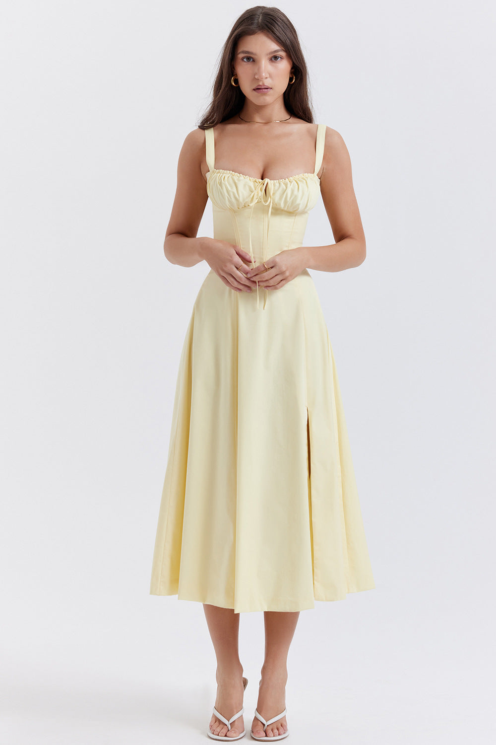 a woman in a yellow dress