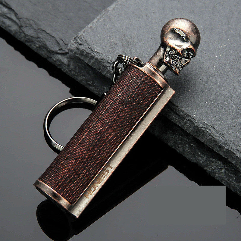 a key chain with a skull on it