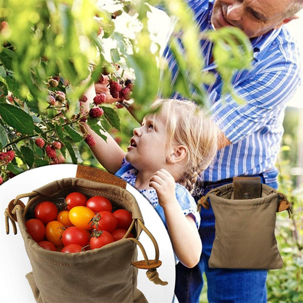 a man and a girl picking tomatoes