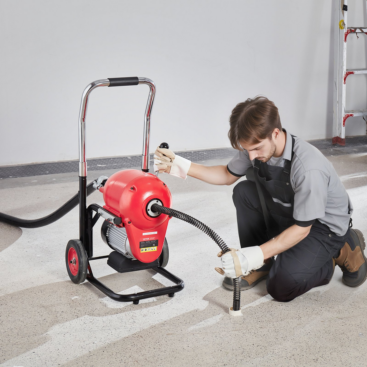 a man in uniform with a hose attached to a red object