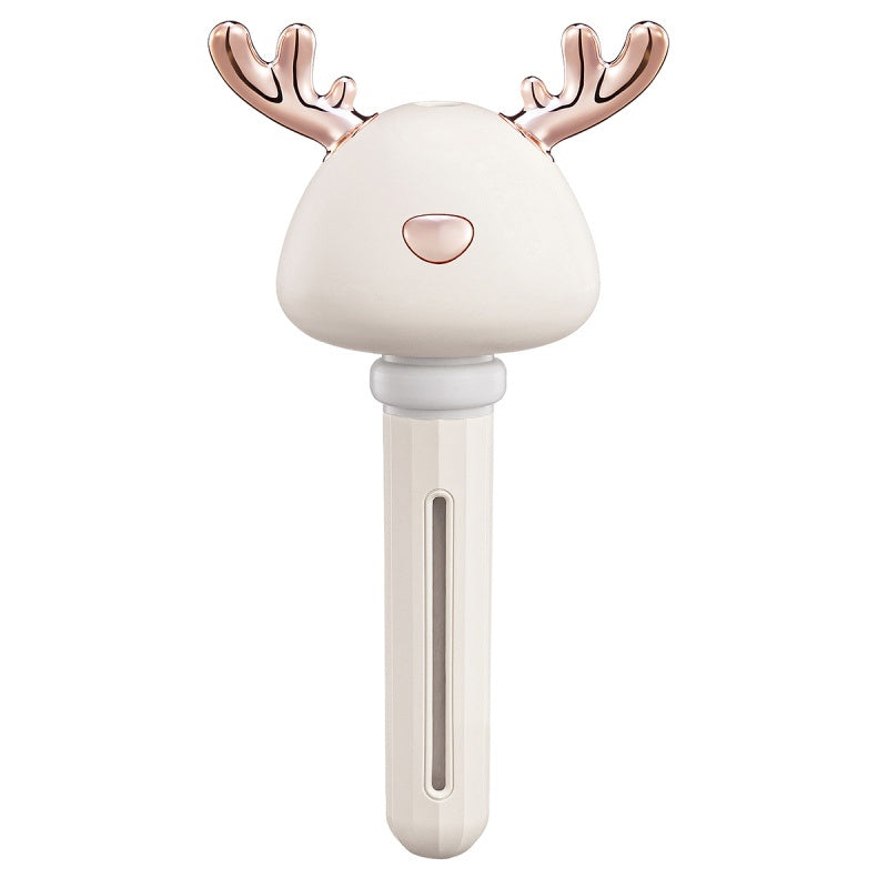 a white and gold reindeer head