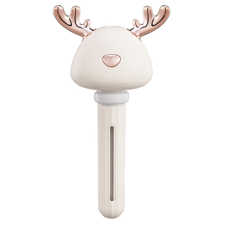 a white and gold reindeer head
