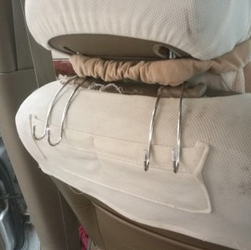 a seat with hooks on it