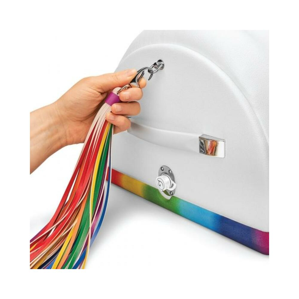 a hand holding a keychain with rainbow colored tassels