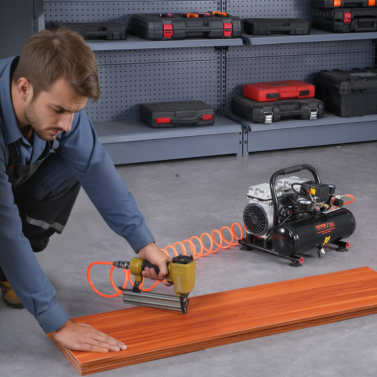 a man using a nail gun to use a wood plank