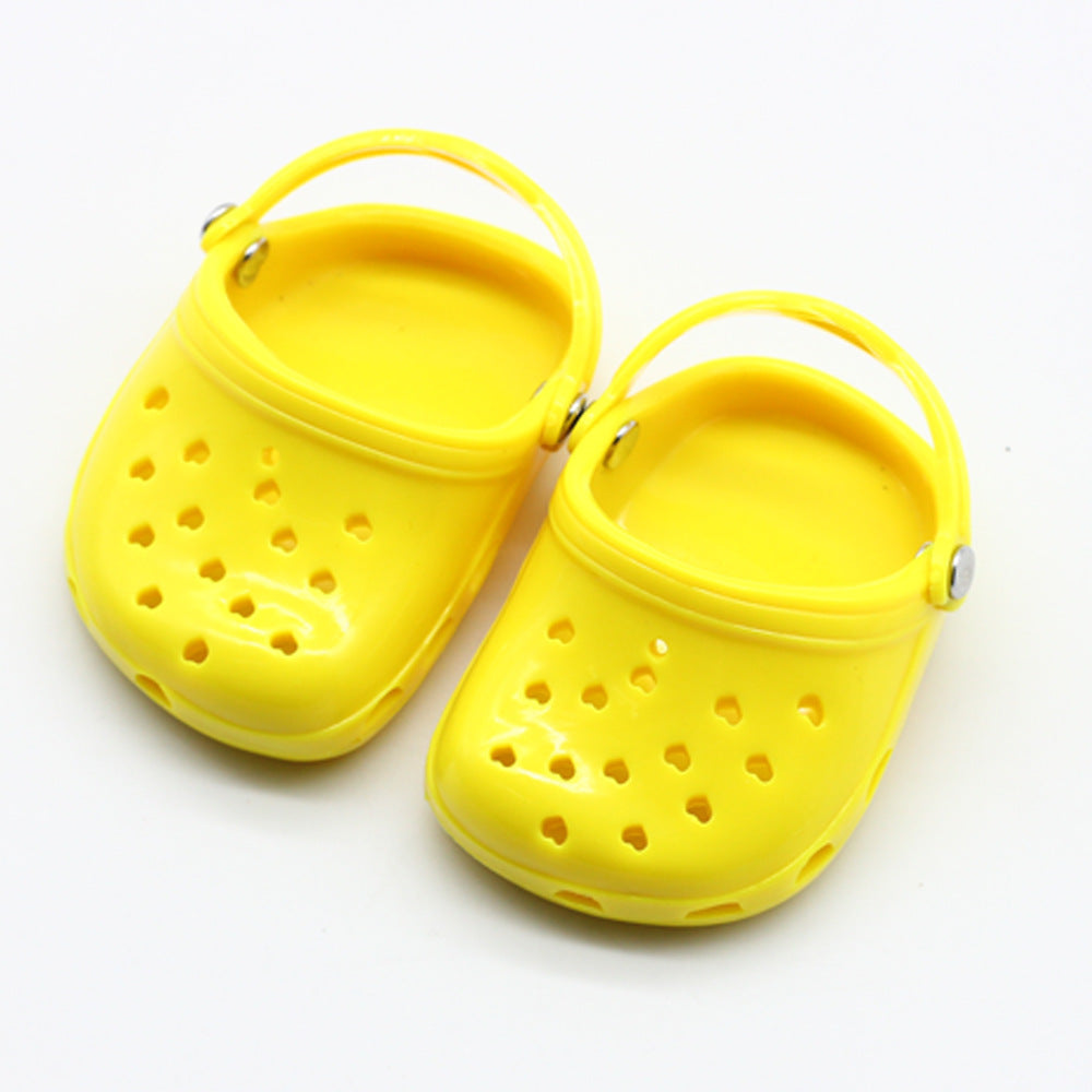 a pair of yellow plastic shoes