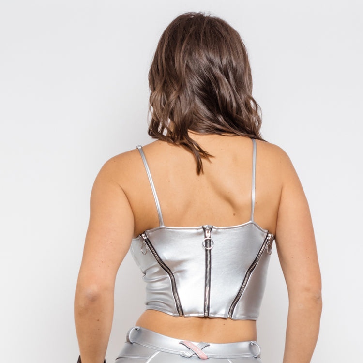 a woman in a silver top