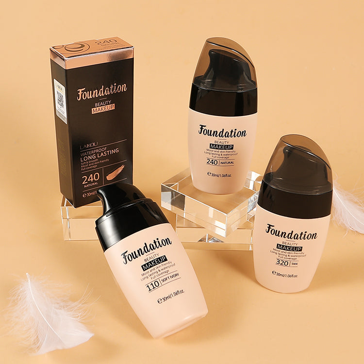 a group of foundation bottles and a box