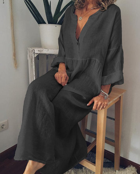 a woman sitting on a stool