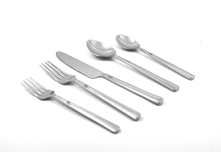 a silverware set with a fork spoon and knife