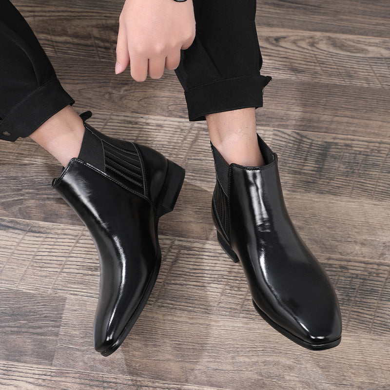a person wearing black shoes