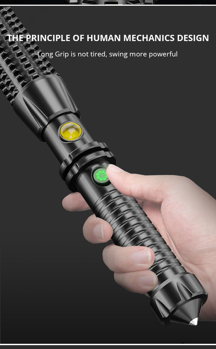 a hand holding a black flashlight
