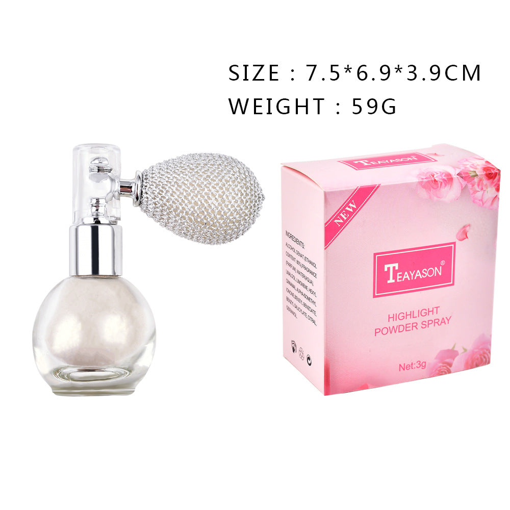 a bottle of perfume next to a box