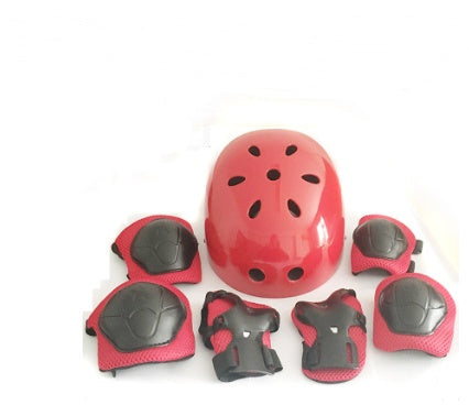 a red helmet and knee pads