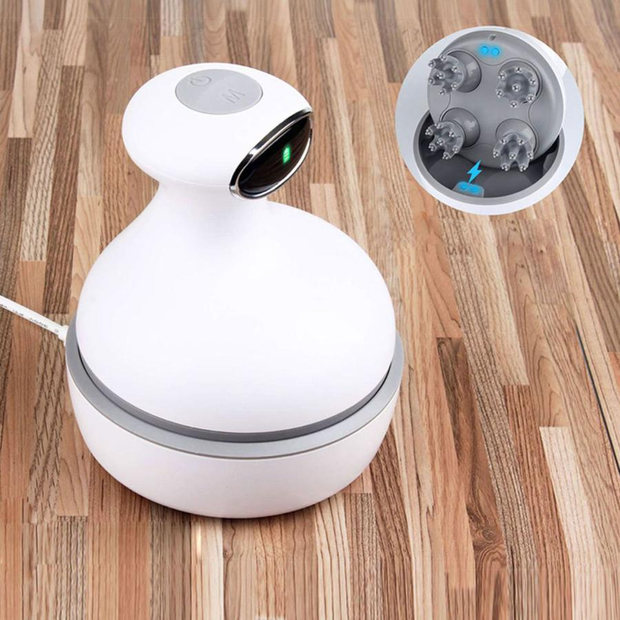 a white device with a round button