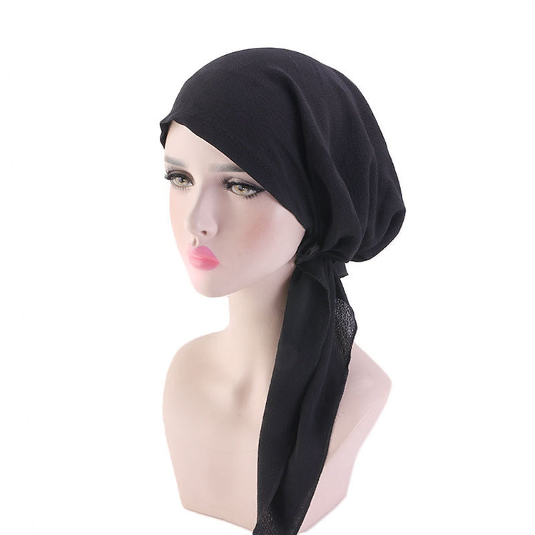 a head scarf on a mannequin