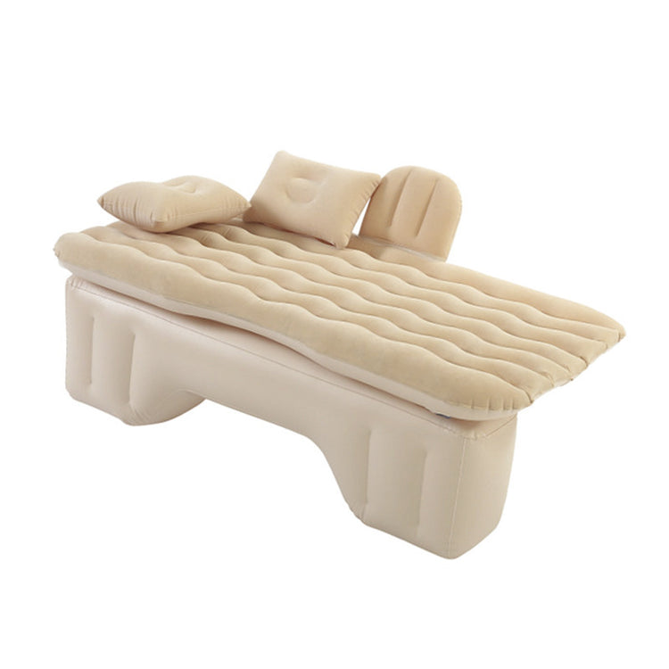 a white inflatable bed with two pillows