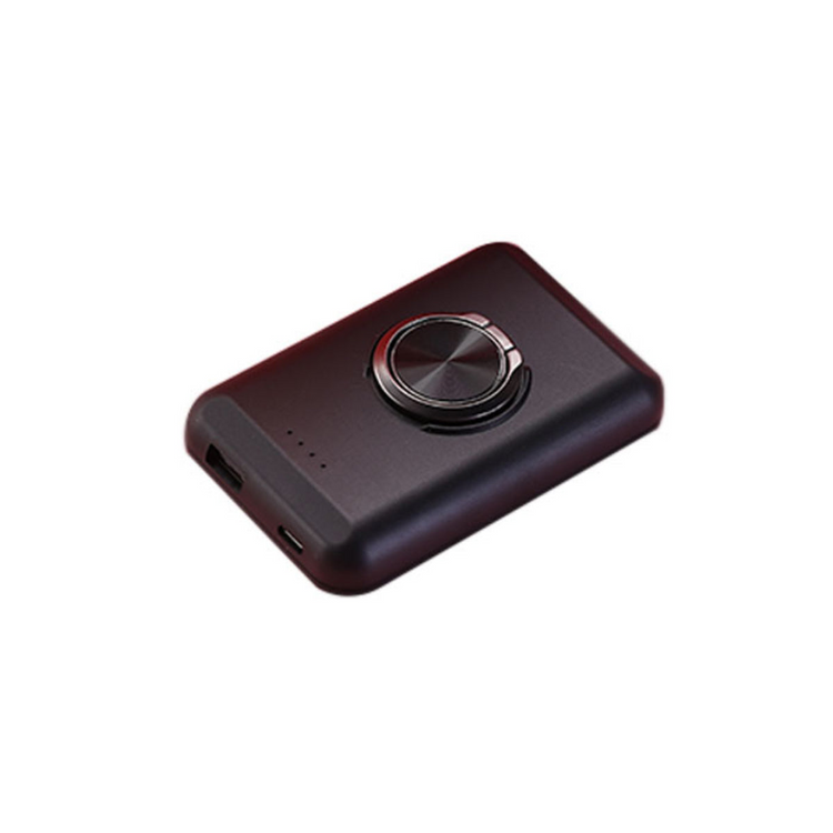 a black rectangular device with a round knob