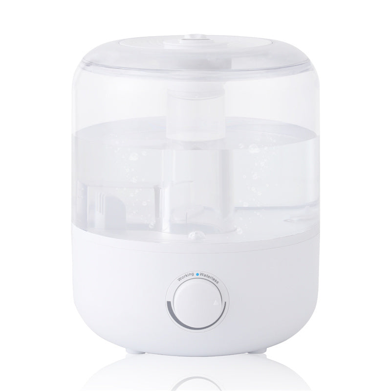 a white humidifier with a clear plastic cover
