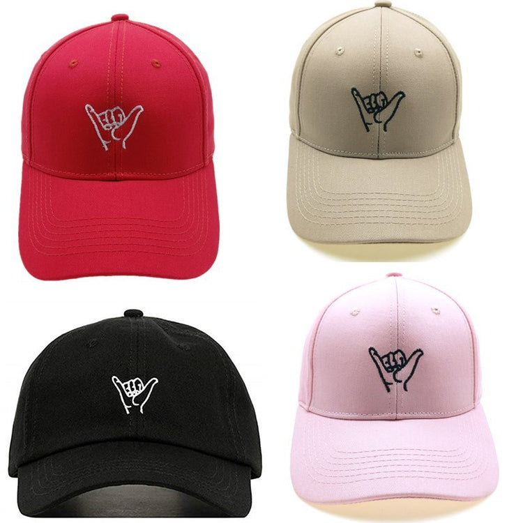 a group of hats with a hand gesture on them